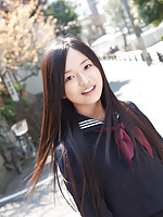 Mayumi Yamanaka Asian takes a walk in her city after classes
