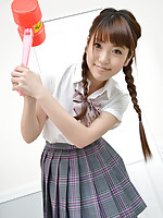 Mizuho Shiraishi Asian with uniform and pigtails plays like child